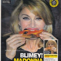 2009 - October - Star - UK - Blimey! Madonna chows down on some pizza!